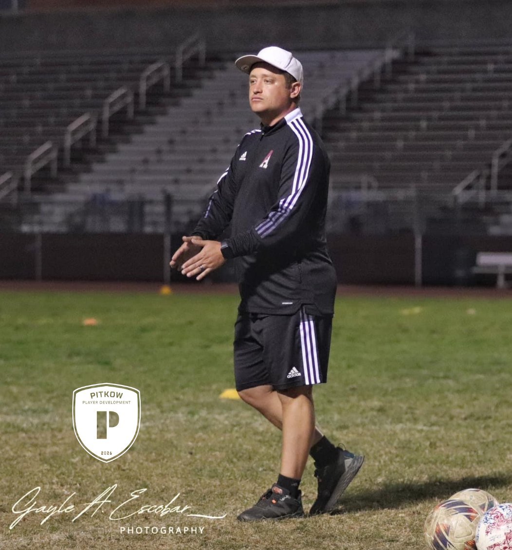 Coach Isaac Pitkow on the field